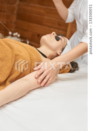 Female Spa Relaxation Young Caucasian Woman Enjoying A Restorative Massage With Eye Mask Female Spa Relaxation Young Caucasian Woman Enjoying A Restorative Massage With Eye Mask 138300051