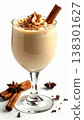 Creamy Light Brown Eggnog in Clear Glass with Cinnamon Stick on White Background 138301627