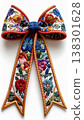 Intricate Floral Embroidered Bow with Red Border Isolated on White Background 138301628