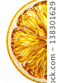 Dried Orange Slice with Golden Hue on White Background Close Up 138301629