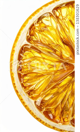 Dried Orange Slice with Golden Hue on White Background Close Up 138301629