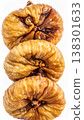 Stack of Three Dried Figs in Vertical Arrangement Against White Background 138301633