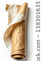 Roll of Crumpled Brown Kraft Paper with White Highlights on White Background 138301635
