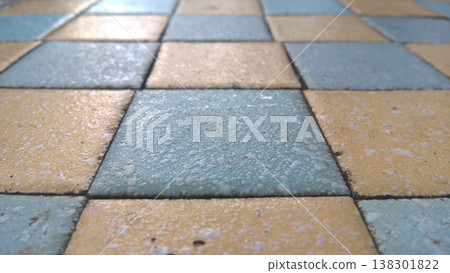 Tile floor pattern texture square ceramic blue yellow grunge closeup tile floor pattern texture square ceramic blue yellow grunge surface detail background outdoor vintage retro style Tile floor pattern texture square ceramic blue yellow grunge closeup tile floor pattern texture square ceramic blue yellow grunge surface detail background outdoor vintage retro style 138301822