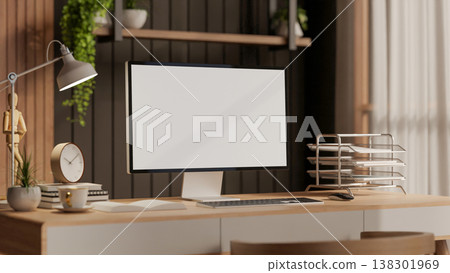 White screen computer with coffee and books on table and chair aside slats wall in wooden style room White screen computer with coffee and books on table and chair aside slats wall in wooden style room 138301969