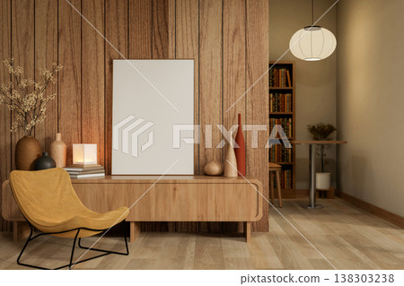 White frame on wooden table and yellow fabric chair on parquet floor with round lamp in room corner. White frame on wooden table and yellow fabric chair on parquet floor with round lamp in room corner. 138303238