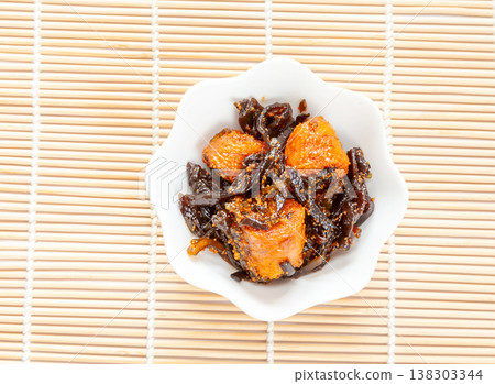 Cod roe, wood ear mushrooms, and kelp simmered in a savory sauce Cod roe, wood ear mushrooms, and kelp simmered in a savory sauce 138303344