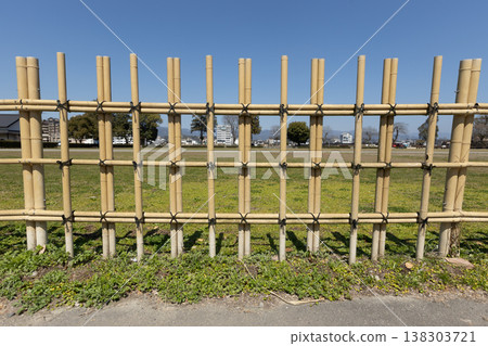 A landscape with a bamboo fence 138303721