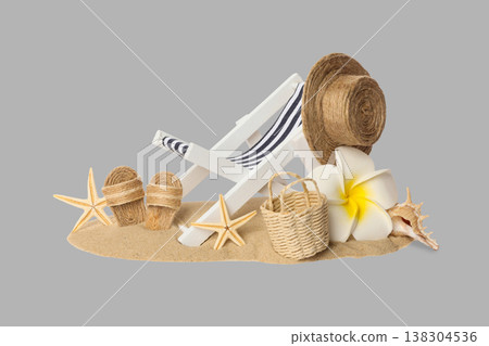Beach chair sits on sand with seashell, starfish, and basket Beach chair sits on sand with seashell, starfish, and basket 138304536