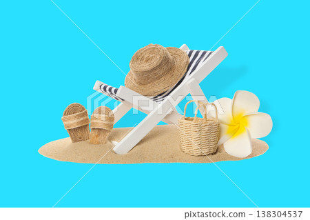 Beach chair with hat, sandals, and flower set on sand Beach chair with hat, sandals, and flower set on sand 138304537