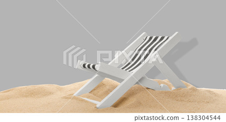 Beach chair sits on warm sand ready for summer relaxation Beach chair sits on warm sand ready for summer relaxation 138304544