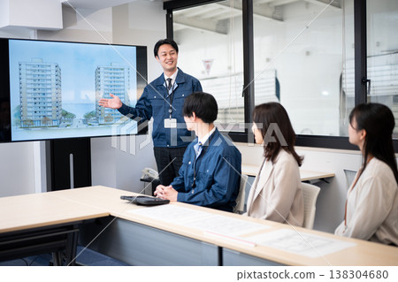 Engineers explaining the building plan Engineers explaining the building plan 138304680