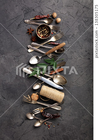 Rustic Culinary Flat-Lay Collection with Vintage Silverware, Spices, Herbs, Greenery, and Kitchen Tools 138305175