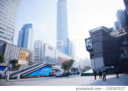 The urban landscape of Shenzhen, China, with its large shopping malls and modern cityscape lined with skyscrapers. The urban landscape of Shenzhen, China, with its large shopping malls and modern cityscape lined with skyscrapers. 138305527