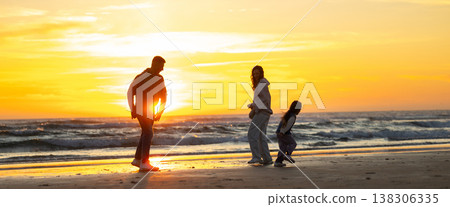 Family walking beach together during golden sunset Family walking beach together during golden sunset 138306335