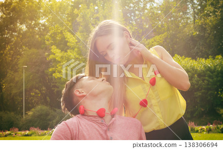 Lovers with hearts outdoor 138306694