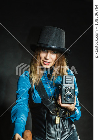 Steampunk with old retro camera and pistol. 138306764