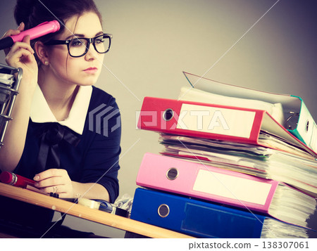 Sleepy business woman in office working Sleepy business woman in office working 138307061