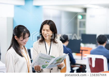 Female manager and young employee Female manager and young employee 138307444