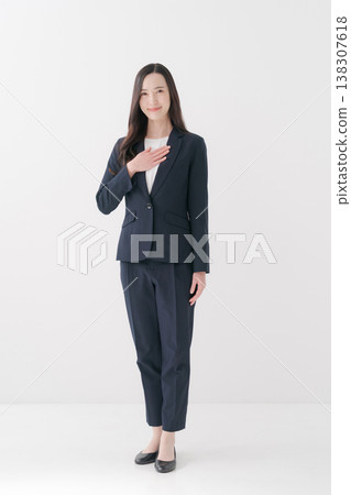 A young woman in a business suit 138307618