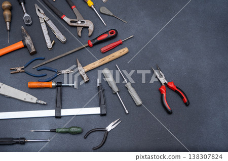 Hand Tools set top view. Professional DIY different Equipment for household. Assorted work and home renovation tool flat lay Hand Tools set top view. Professional DIY different Equipment for household. Assorted work and home renovation tool flat lay 138307824