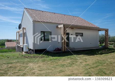Modern modular minimalistic house with energy-efficient heating and cooling and solar-ready design in rural setting Modern modular minimalistic house with energy-efficient heating and cooling and solar-ready design in rural setting 138309821
