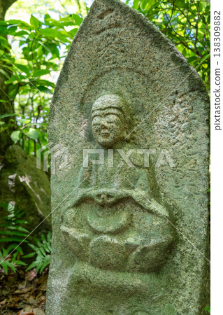 Monk statue in serene Mitaki-Dera temple garden in Hiroshima 138309882