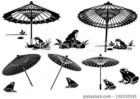 A set of monochrome silhouette illustrations of a Japanese umbrella and a frog in a woodblock print style. A set of monochrome silhouette illustrations of a Japanese umbrella and a frog in a woodblock print style. 138310595