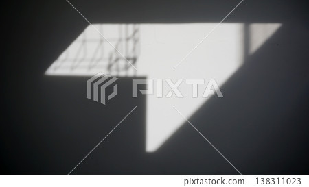 Shadow on the wall of a house. Abstract blurred background for design. Shadow on the wall of a house. Abstract blurred background for design. 138311023