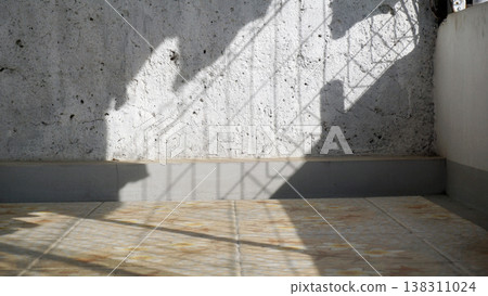 Ceramic floor with white concrete walls in the morning, for product display or montage. 138311024