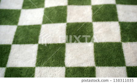 Green checkered tablecloth as a background. Green checkered tablecloth as a background. 138311035
