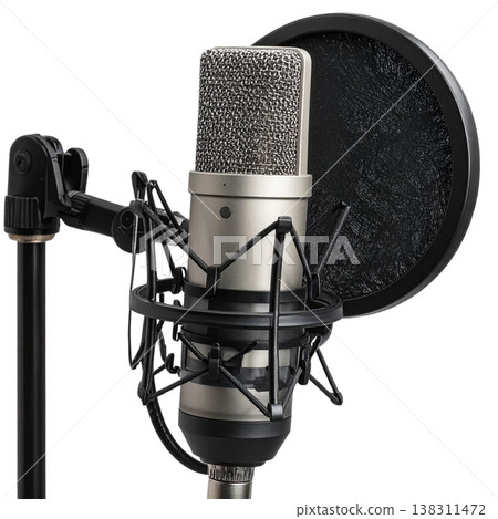 A professional-grade black microphone is placed against a white background. A professional-grade black microphone is placed against a white background. 138311472