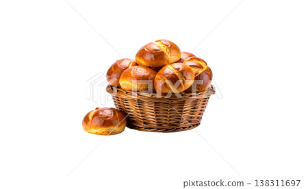 A close-up image of freshly baked wheat bread and sweet pastries in a brown basket. 138311697