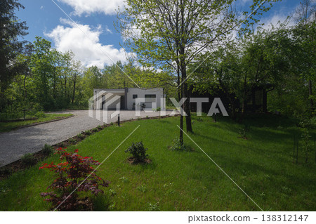 Modular modern minimalist home in wooded setting with low energy design and high efficiency systems 138312147