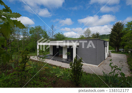 Modular modern minimalist low energy house with solar panels and hi efficiency heating and cooling in rural setting Modular modern minimalist low energy house with solar panels and hi efficiency heating and cooling in rural setting 138312177