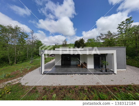 Modular modern minimalist low energy house with covered porch in a forest setting Modular modern minimalist low energy house with covered porch in a forest setting 138312184