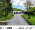Modular modern minimalist house surrounded by green landscape with low energy and solar features 138312187