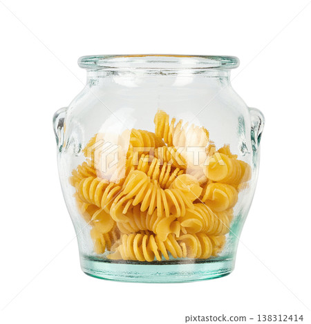 Pasta close-up. Fusilli spirale in a glass jar, isolated on white background. Full depth of field. 138312414