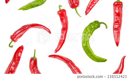 Red and green hot chili peppers isolated on white background. Red and green hot chili peppers isolated on white background. 138312421