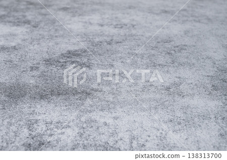 A blank gray concrete texture in a loft-style setting against a neutral background. A blank gray concrete texture in a loft-style setting against a neutral background. 138313700