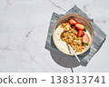 Balanced breakfast with yogurt, granola and strawberry on marble background. Top view 138313741