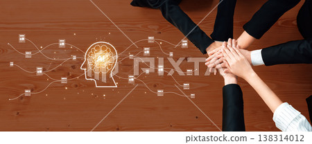 Diverse Hands Collaborating Over a Wooden Table with AI Brain Concept Representation Symbolizing Teamwork and Technology Integration in Business Strategy Trope Diverse Hands Collaborating Over a Wooden Table with AI Brain Concept Representation Symbolizing Teamwork and Technology Integration in Business Strategy Trope 138314012