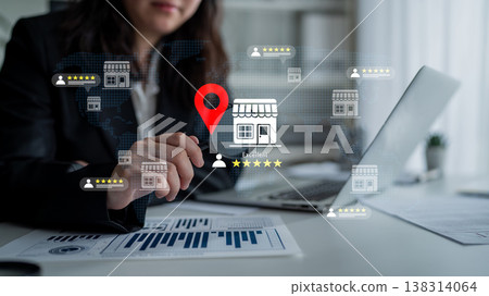 Business professional analyzing data trends and using technology for location-based services in a modern office environment with charts and graphics Gantry 138314064