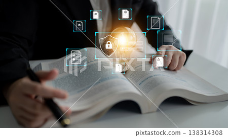 Business professional analyzing legal documents with digital security icons and light bulb representing innovative ideas in law and technology integration Quark Business professional analyzing legal documents with digital security icons and light bulb representing innovative ideas in law and technology integration Quark 138314308
