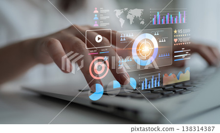 Futuristic digital interface with data analytics visualization for business analysis and decision making with hands typing on laptop keyboard Gantry Futuristic digital interface with data analytics visualization for business analysis and decision making with hands typing on laptop keyboard Gantry 138314387