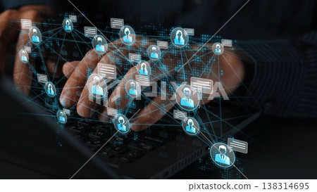 Hands are typing on a laptop while various digital icons appear, illustrating communication and connectivity in a tech-savvy business setting. Sigmoid Hands are typing on a laptop while various digital icons appear, illustrating communication and connectivity in a tech-savvy business setting. Sigmoid 138314695