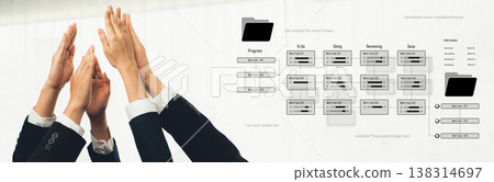 Collaborative Business Hands Clapping in Celebration with Workflow Charts and Digital Files Representing Accomplishments in Professional Environment Trope 138314697