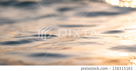 Ocean water sunset waves with vibrant colors, glowing reflections, serene tropical nature background Ocean water sunset waves with vibrant colors, glowing reflections, serene tropical nature background 138315161