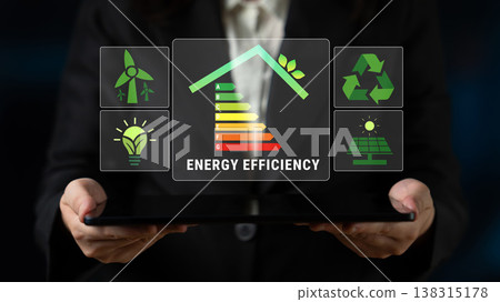 Hands Holding Tablet Displaying Energy Efficiency Icons and Graphs Representing Sustainability, Renewable Energy, and Eco-Friendly Practices Quark Hands Holding Tablet Displaying Energy Efficiency Icons and Graphs Representing Sustainability, Renewable Energy, and Eco-Friendly Practices Quark 138315178