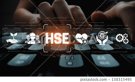 Hands on a keyboard with health, safety, and environment icons surrounding it, symbolizing the importance of workplace safety and compliance in modern business practices. Sigmoid 138315495